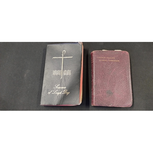 133 - Selection of religious items including 4 pocket Bibles, wooden statue of mother Mary, and white glas... 