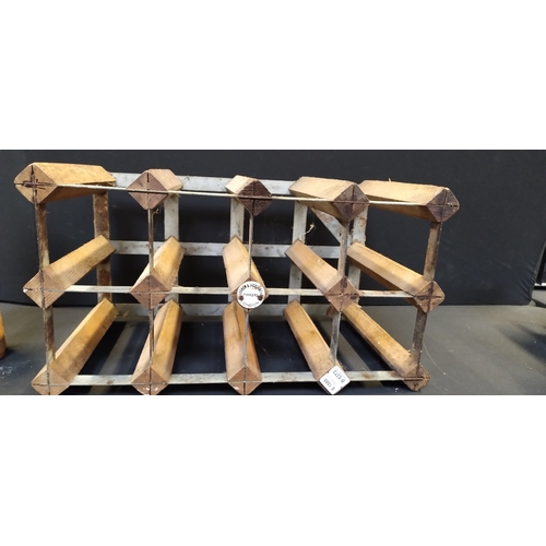 139 - Wine rack with 2 stoneware bottles