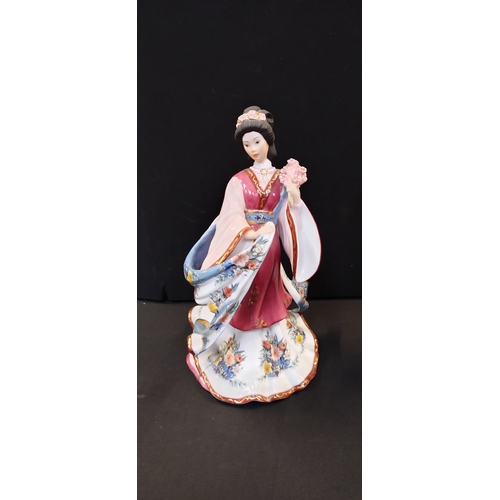 147 - Two oriental figurines from the Danbury mint, The Plum Blossom Princess and Iris Princess