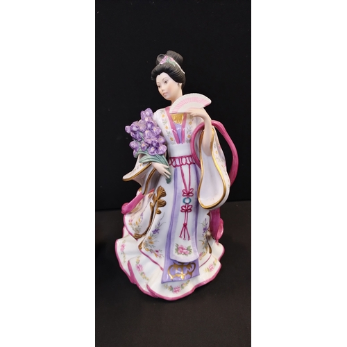 147 - Two oriental figurines from the Danbury mint, The Plum Blossom Princess and Iris Princess