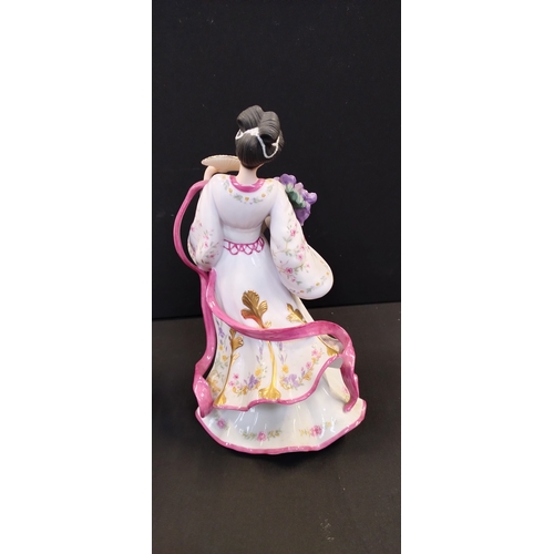 147 - Two oriental figurines from the Danbury mint, The Plum Blossom Princess and Iris Princess