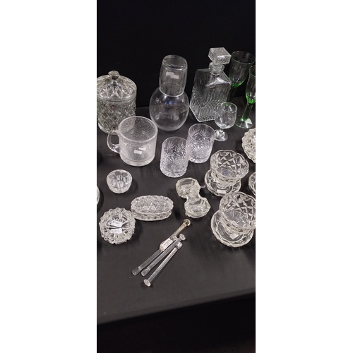 166 - Large quantity of various glassware including dessert dishes, glass frogs, ashtray, and other items