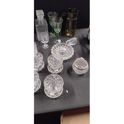 166 - Large quantity of various glassware including dessert dishes, glass frogs, ashtray, and other items