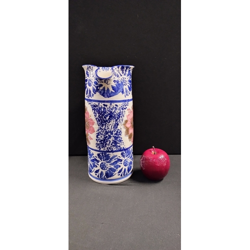 207 - Tall Ranquilline blue and white pitcher jug with a floral band around the centre. Measures approx H ... 