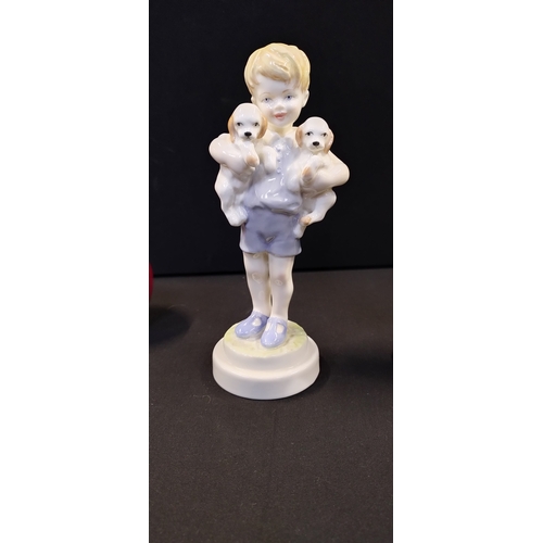 222 - 2 Royal Worcester figurines. Wednesday's Child and Mondays child