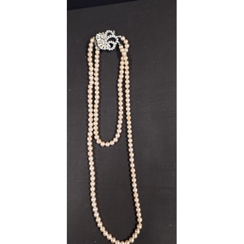 11 - Six faux pearl necklaces some with rhinestone clasps