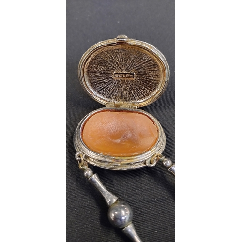 13 - Vintage Estée Lauder solid perfume locket on a necklace