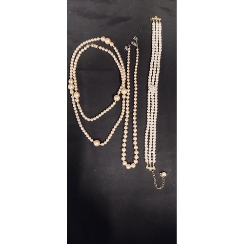 21 - Various costume jewellery including faux pearls, earrings necklaces and a brooch