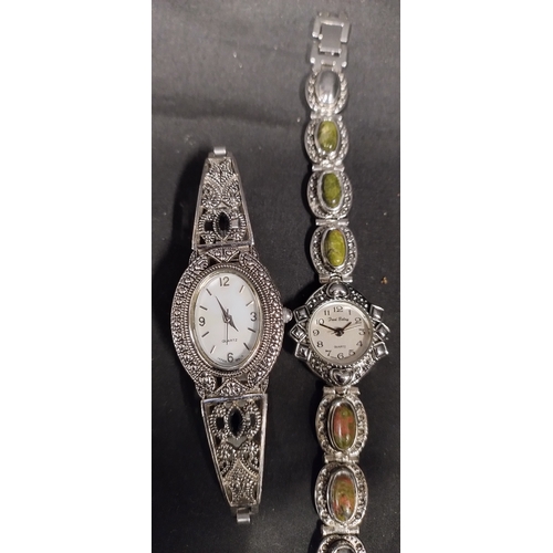 23 - Two ladies watches including Fred Baley with agate cabochon stones , and a mother of pearl faced wat... 