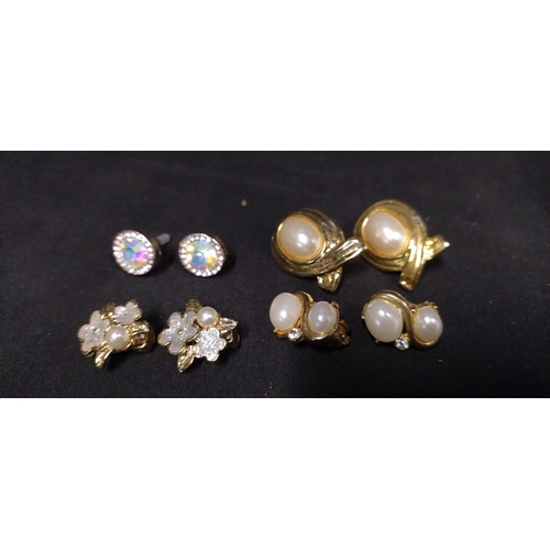 11 - 9 pairs of ladies clip on earrings with various designs