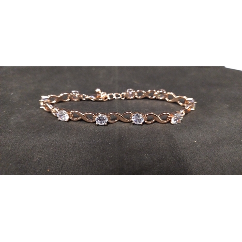 17 - Jon Richard Rose gold coloured bracelet with crystals inset