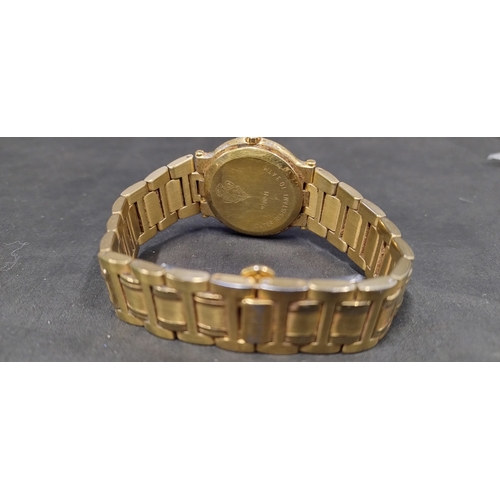 25 - Gold plated Gucci timepiece 7 jewel