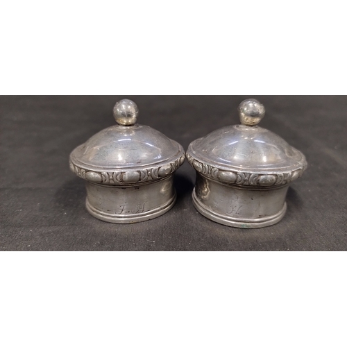 32 - Two sterling silver bottle tops