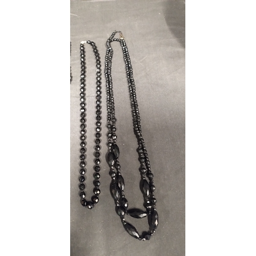 40 - Seven various styles black faceted bead necklaces