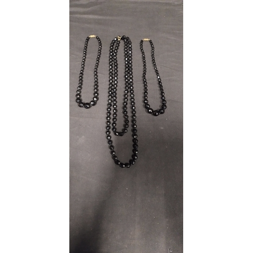 40 - Seven various styles black faceted bead necklaces