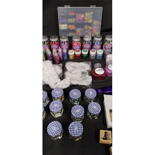 65 - Selection of crafting items including glitters, buttons, stamps, glues and tapes