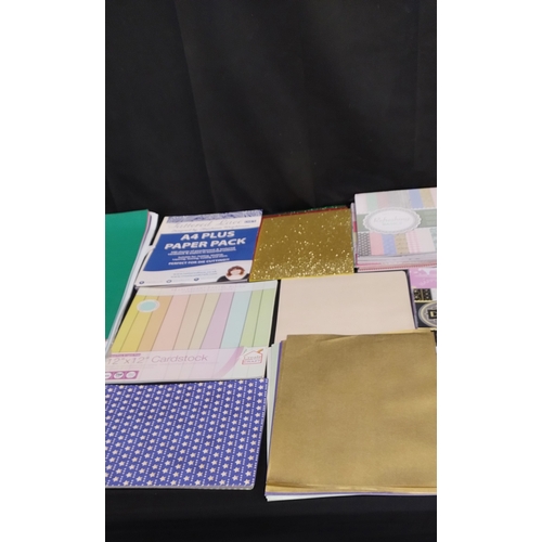 104 - Various crafting papers and cards, pearlescent, glitter, long paper and graph paper