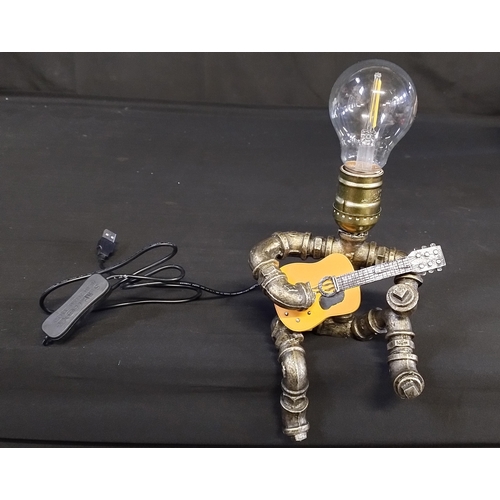 116 - Steampunk style figure with guitar usb lamp with bulb tested for power