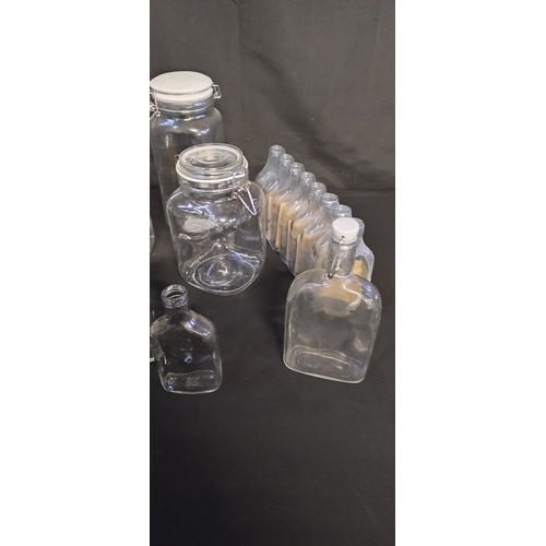 121 - Various bottles, storage jars, and a alcohol hydrometer