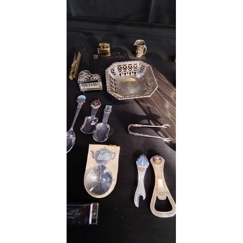 131 - Mixed lot of brass, silver plated and other items including harmonica, sugar nips perfume bottle and... 