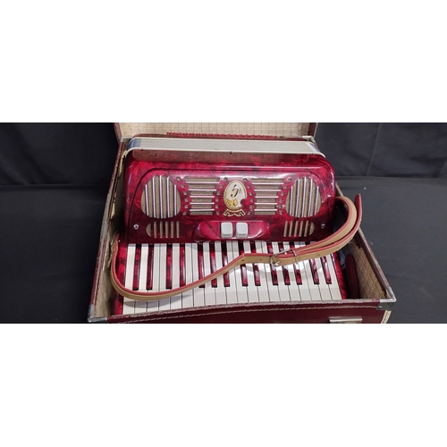 142 - 1970 Galanti 120 bass compact piano accordion, in beautiful condition red metallic casing and red ke... 