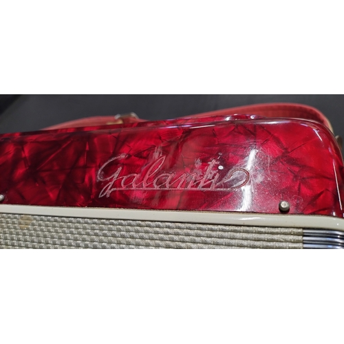 142 - 1970 Galanti 120 bass compact piano accordion, in beautiful condition red metallic casing and red ke... 