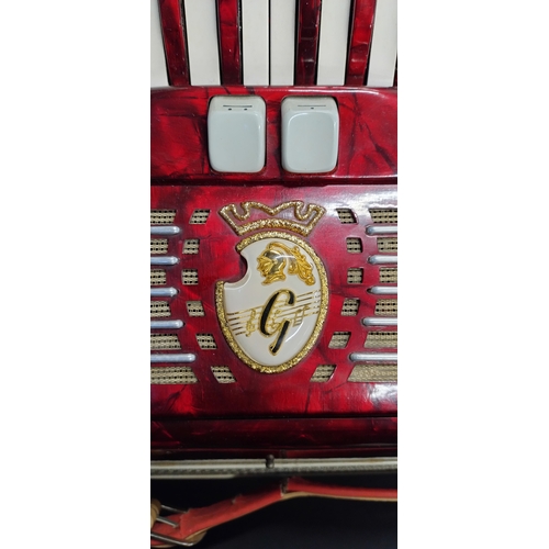 142 - 1970 Galanti 120 bass compact piano accordion, in beautiful condition red metallic casing and red ke... 