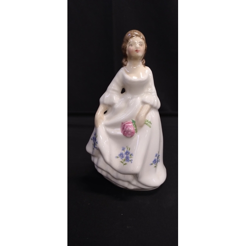 165 - Two Staffordshire figurines of ladies