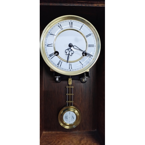 171 - Schenkenzell Edwin Jäger Germany wall clock in walnut case with enamel dial with Roman numerals and ... 