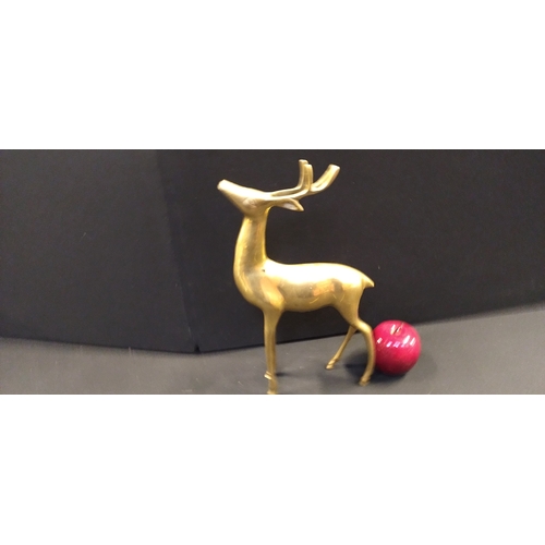 252 - Solid Brass deer. Measures approx H 32 x W 19.5 x D 4.5 cm