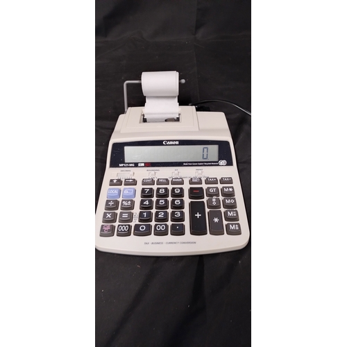 295 - Boxed Cannon MP 121-MG.  2 Colour printing Calculator tested for power