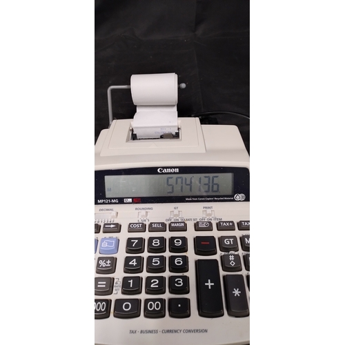 295 - Boxed Cannon MP 121-MG.  2 Colour printing Calculator tested for power