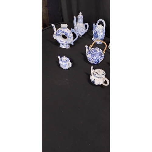 337 - Collection of 18 various teapots including vintage and blue and white