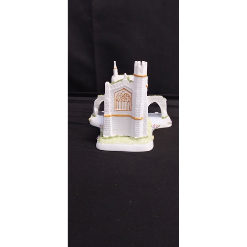 348 - Three Coalport collectable miniature cottages. The lighthouse,The Chantry Chapel of St.Mary's on The... 