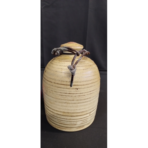 377 - Vintage stoneware salt pot with leather strap