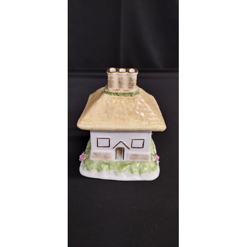 378 - Three Coalport collectable miniature cottages, The Bridge House, Chimney House and Cherry Tree Cotta... 