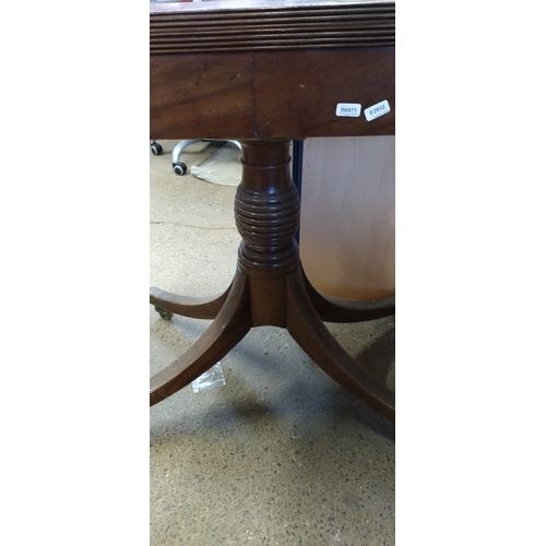 416 - Mahogany Half folding Pembroke table with brass casters. Measures approx 73 x 90.5 x 80.5 cm fully e... 