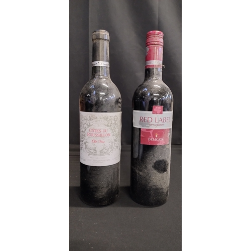 45 - Two bottles of unopened red wine. 2011 Côtes Du Roussillon old wine, and a Red Label Delicata