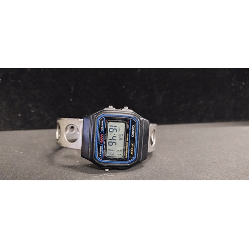 9 - Mens digital casio watch with a metal 007 watch strap