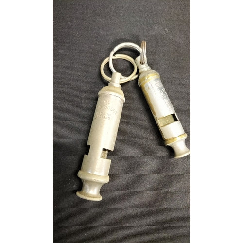 55 - 2 Vintage scout and girl guides whistles