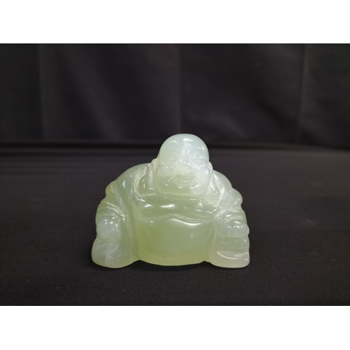 56 - Kaolinite Buddha and decorated resin elephant