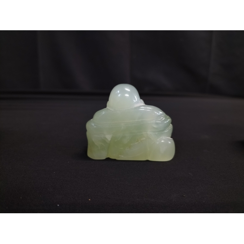 56 - Kaolinite Buddha and decorated resin elephant