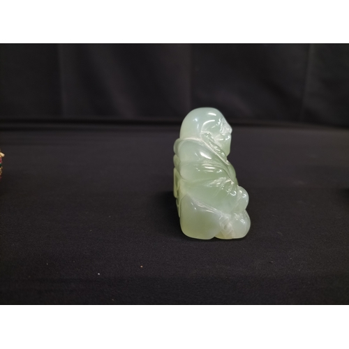 56 - Kaolinite Buddha and decorated resin elephant