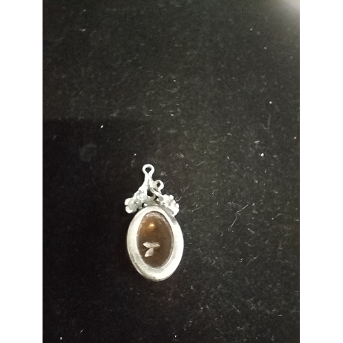 21 - Sterling silver and amber pendant measures approx 2.5 x 1 inch