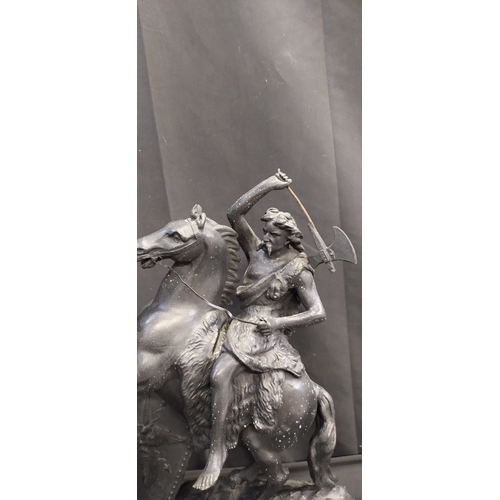 63 - Theodore Doriot.spelter Warrior on horseback mounted on a wooden base. Measures approx H 49 x W 39.5... 