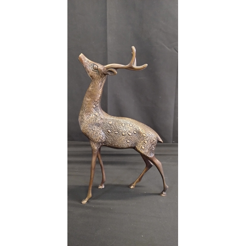 72 - Sculpture of deer,  doe and buck made of bronze. Measures approx H 32 x W 20.5 x D 10 cm