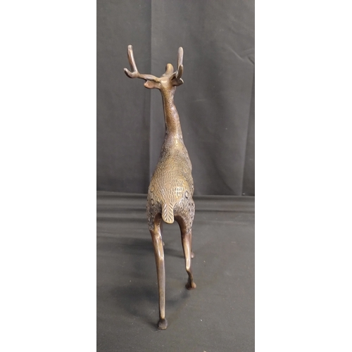 72 - Sculpture of deer,  doe and buck made of bronze. Measures approx H 32 x W 20.5 x D 10 cm