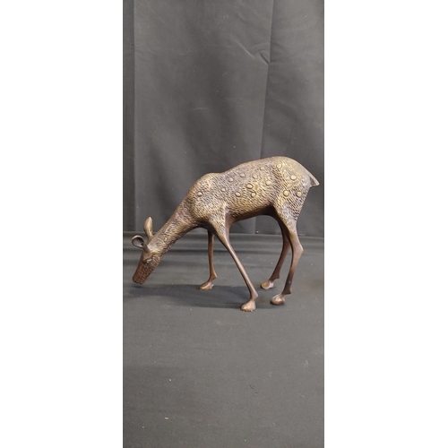 72 - Sculpture of deer,  doe and buck made of bronze. Measures approx H 32 x W 20.5 x D 10 cm