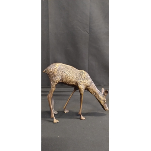 72 - Sculpture of deer,  doe and buck made of bronze. Measures approx H 32 x W 20.5 x D 10 cm