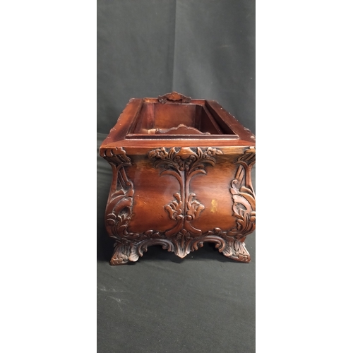 74 - Georgian Mahogany tea caddy with ornate carving to lid & body with lift out tray and 3 fixed compart... 